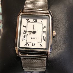 NWOT silver tone mesh SKC watch